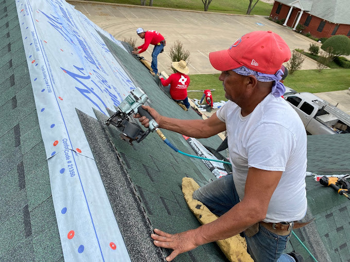 residential PROCO roofing project nailing in shingles