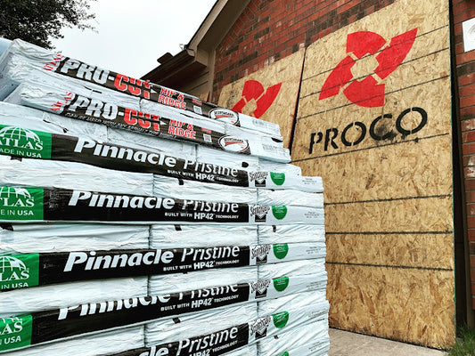 A PROCO residential roofing project with shingles and PROCO logo on roof decking